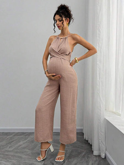 Maternity Jumpsuit With Wooden Bead Halter Neck, Tie Front Waist Bow Detail, Full Length Pants
