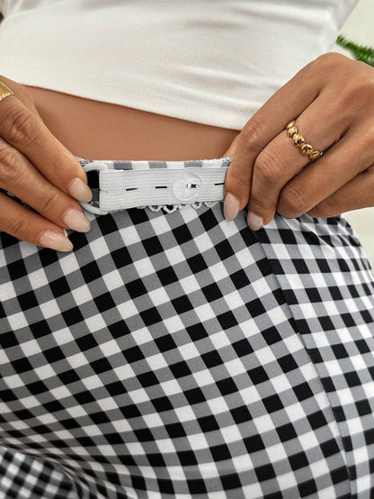 Maternity Clothes Maternity Bottoms Casual Summer Adjustable Waistband, Lace Trim At The Waistband, Black And White Checkered Maternity Leggings With A Three-Quarter Length Split. Checkered Pattern.