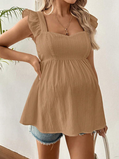 White Sleeveless Peplum Maternity Blouse Slim Fit Flounce Strap Neckline Flared Hem Long Length Woven Polyester Top