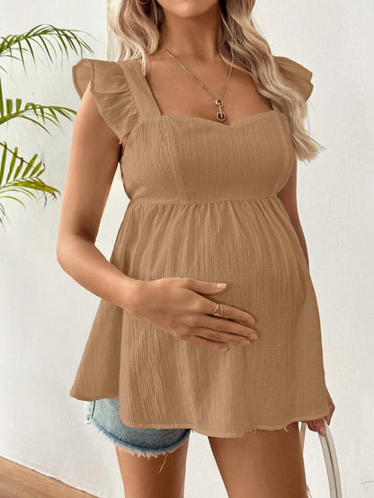 White Sleeveless Peplum Maternity Blouse Slim Fit Flounce Strap Neckline Flared Hem Long Length Woven Polyester Top