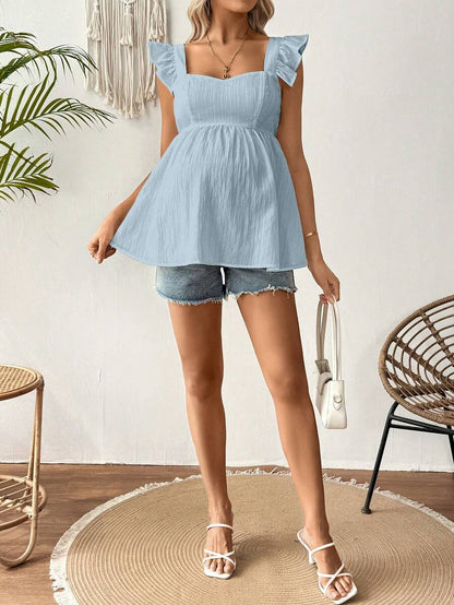 White Sleeveless Peplum Maternity Blouse Slim Fit Flounce Strap Neckline Flared Hem Long Length Woven Polyester Top