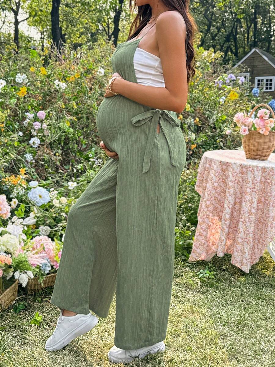 Black Solid Spaghetti Strap Maternity Jumpsuit – Loose Fit Side Knot Sleeveless Romper for Beach, Casual Everyday & Summer Travel