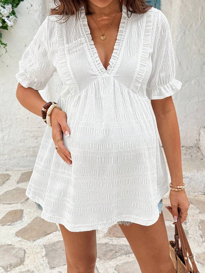 White Woven Crepe Maternity Peplum Top – Elegant V-Neck Flounce Half Sleeve Ruffle Hem Summer Blouse for Pregnant Women – Semi-Sheer Holiday Doll Style Shirt