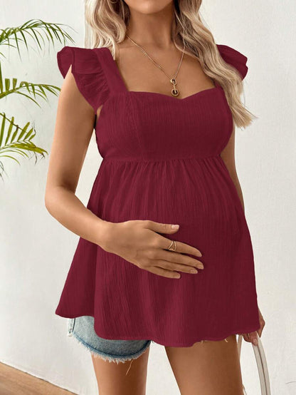 White Sleeveless Peplum Maternity Blouse Slim Fit Flounce Strap Neckline Flared Hem Long Length Woven Polyester Top