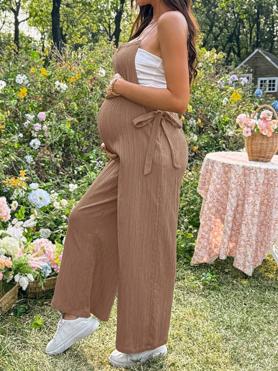 Black Solid Spaghetti Strap Maternity Jumpsuit – Loose Fit Side Knot Sleeveless Romper for Beach, Casual Everyday & Summer Travel