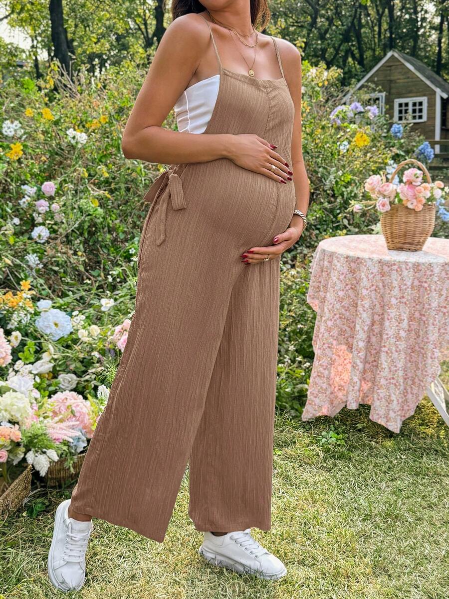 Black Solid Spaghetti Strap Maternity Jumpsuit – Loose Fit Side Knot Sleeveless Romper for Beach, Casual Everyday & Summer Travel