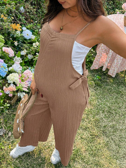 Black Solid Spaghetti Strap Maternity Jumpsuit – Loose Fit Side Knot Sleeveless Romper for Beach, Casual Everyday & Summer Travel