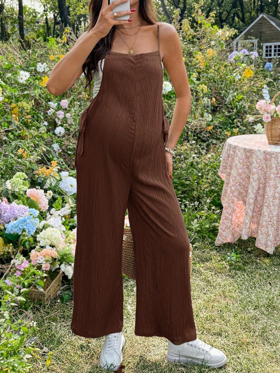 Black Solid Spaghetti Strap Maternity Jumpsuit – Loose Fit Side Knot Sleeveless Romper for Beach, Casual Everyday & Summer Travel