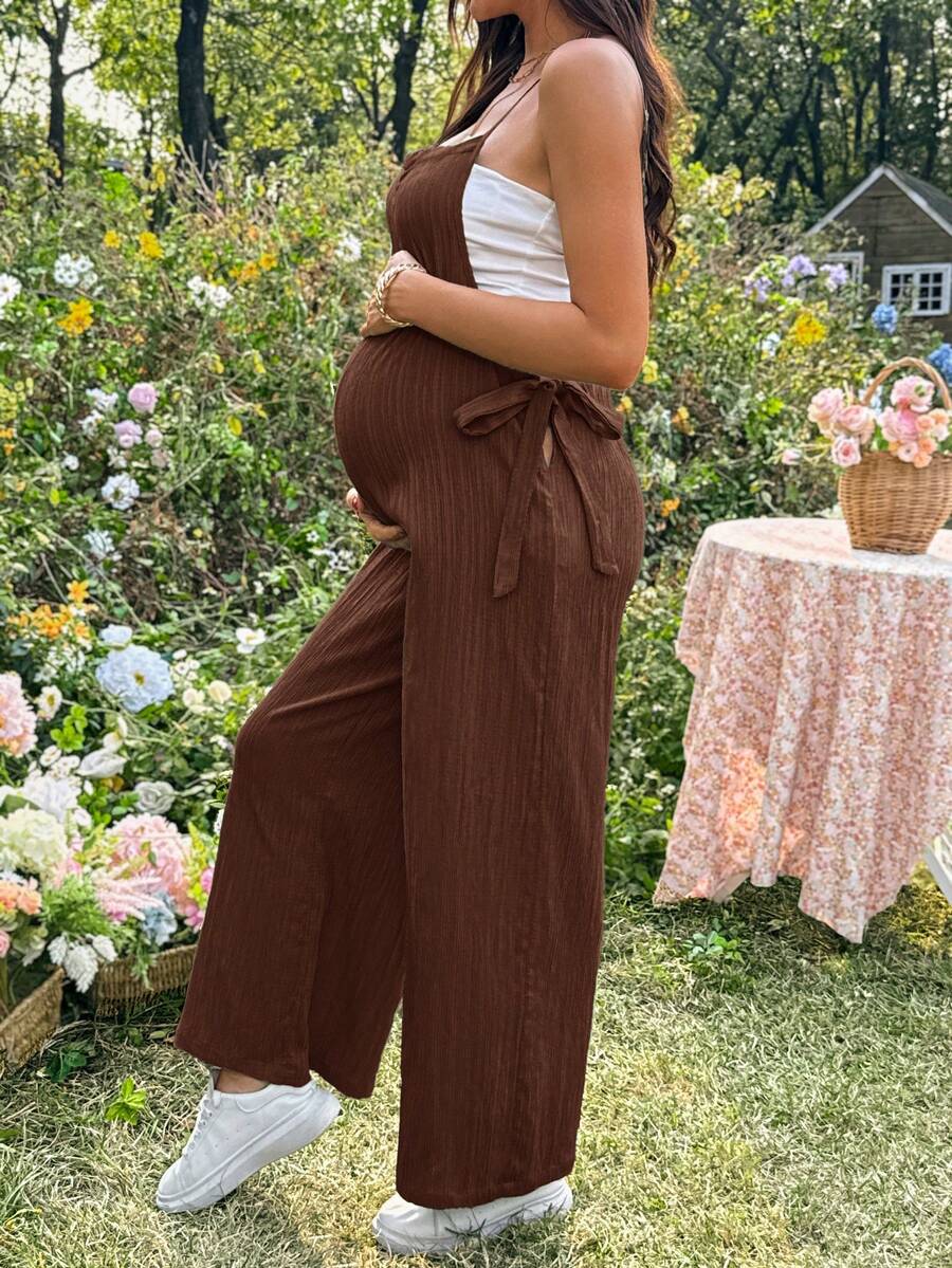 Black Solid Spaghetti Strap Maternity Jumpsuit – Loose Fit Side Knot Sleeveless Romper for Beach, Casual Everyday & Summer Travel