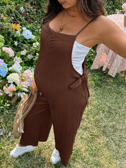 Black Solid Spaghetti Strap Maternity Jumpsuit – Loose Fit Side Knot Sleeveless Romper for Beach, Casual Everyday & Summer Travel