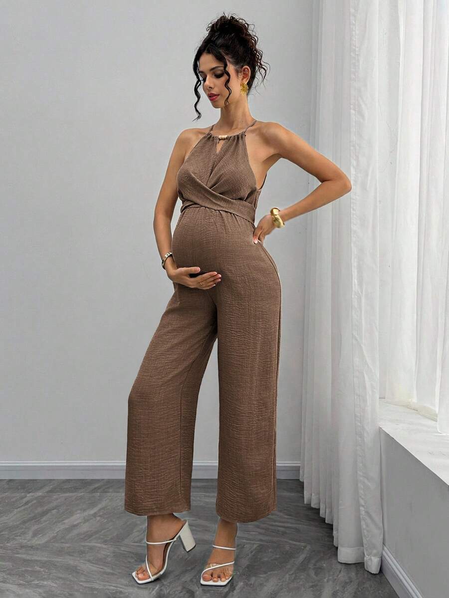 Maternity Jumpsuit With Wooden Bead Halter Neck, Tie Front Waist Bow Detail, Full Length Pants Maternity Women Pregnancy Clothes Maternity Clothes Baby Shower Guest Outfit Maternity Jumpsuits For Woman Jumpsuit For Pregnant Woman Pregnancy Outfits
