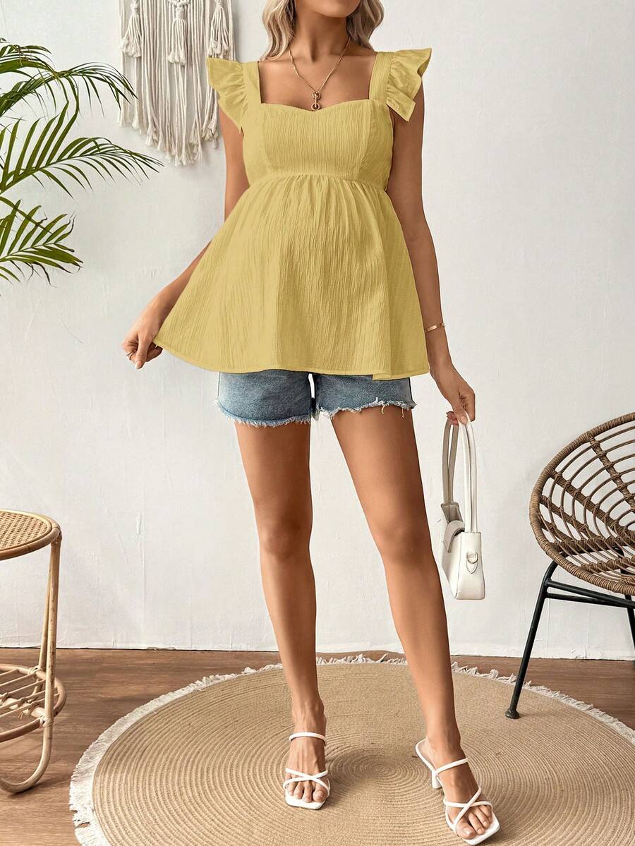 White Sleeveless Peplum Maternity Blouse Slim Fit Flounce Strap Neckline Flared Hem Long Length Woven Polyester Top