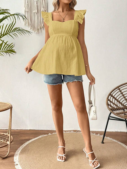 White Sleeveless Peplum Maternity Blouse Slim Fit Flounce Strap Neckline Flared Hem Long Length Woven Polyester Top