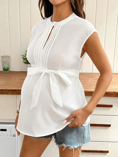 White Pleated Maternity Blouse – Elegant Stand Collar Tie-Waist Shirt with Batwing Cap Sleeves and Asymmetrical Hem for Office, Church, & Casual Wear