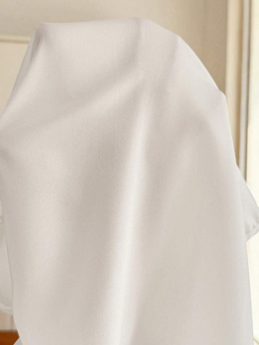 White Pleated Maternity Blouse – Elegant Stand Collar Tie-Waist Shirt with Batwing Cap Sleeves and Asymmetrical Hem for Office, Church, & Casual Wear