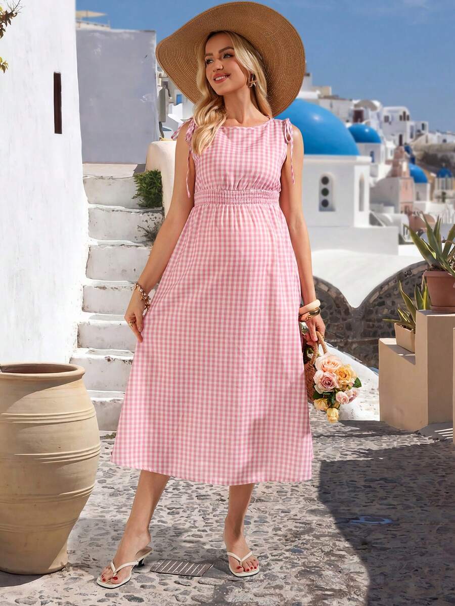 Pink and White Plaid Sleeveless A-Line Midi Maternity Dress - High Waist Round Neck Picnic Dress with Knot Detail and Flared Ruffle Hem