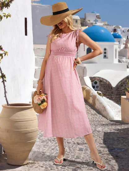 Pink and White Plaid Sleeveless A-Line Midi Maternity Dress - High Waist Round Neck Picnic Dress with Knot Detail and Flared Ruffle Hem