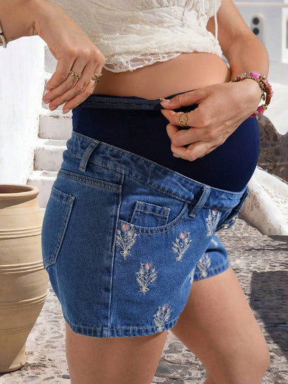Embroidered Floral Over-Belly Maternity Denim Shorts – Mid-Blue Wash Cotton Loose Fit Mini Shorts for Spring & Summer