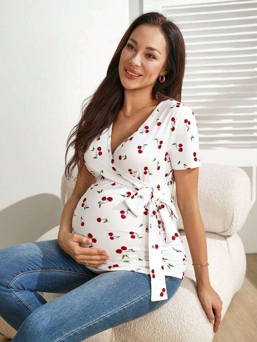 Cherry Print Short Sleeve Maternity and Nursing Top with V-Neck Wrap Tie Detail Slim Fit High Stretch Knitted Prenatal Shirt in Red and White