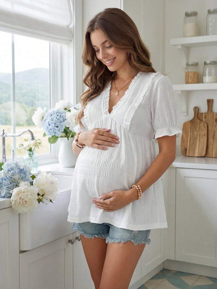 White Woven Crepe Maternity Peplum Top – Elegant V-Neck Flounce Half Sleeve Ruffle Hem Summer Blouse for Pregnant Women – Semi-Sheer Holiday Doll Style Shirt