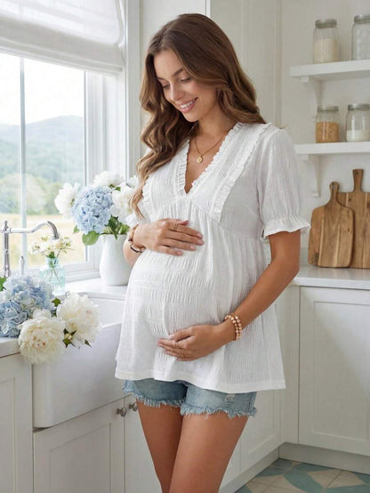 White Woven Crepe Maternity Peplum Top – Elegant V-Neck Flounce Half Sleeve Ruffle Hem Summer Blouse for Pregnant Women – Semi-Sheer Holiday Doll Style Shirt